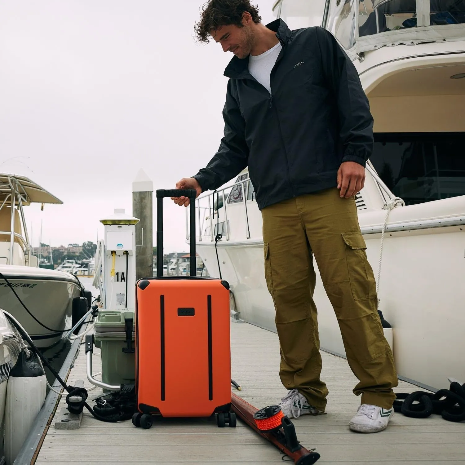 The Ridge Premium Hard Shell Carry On Luggage - TSA Approved Lock - 360° Spinner Wheels for Travel - Basecamp Orange
